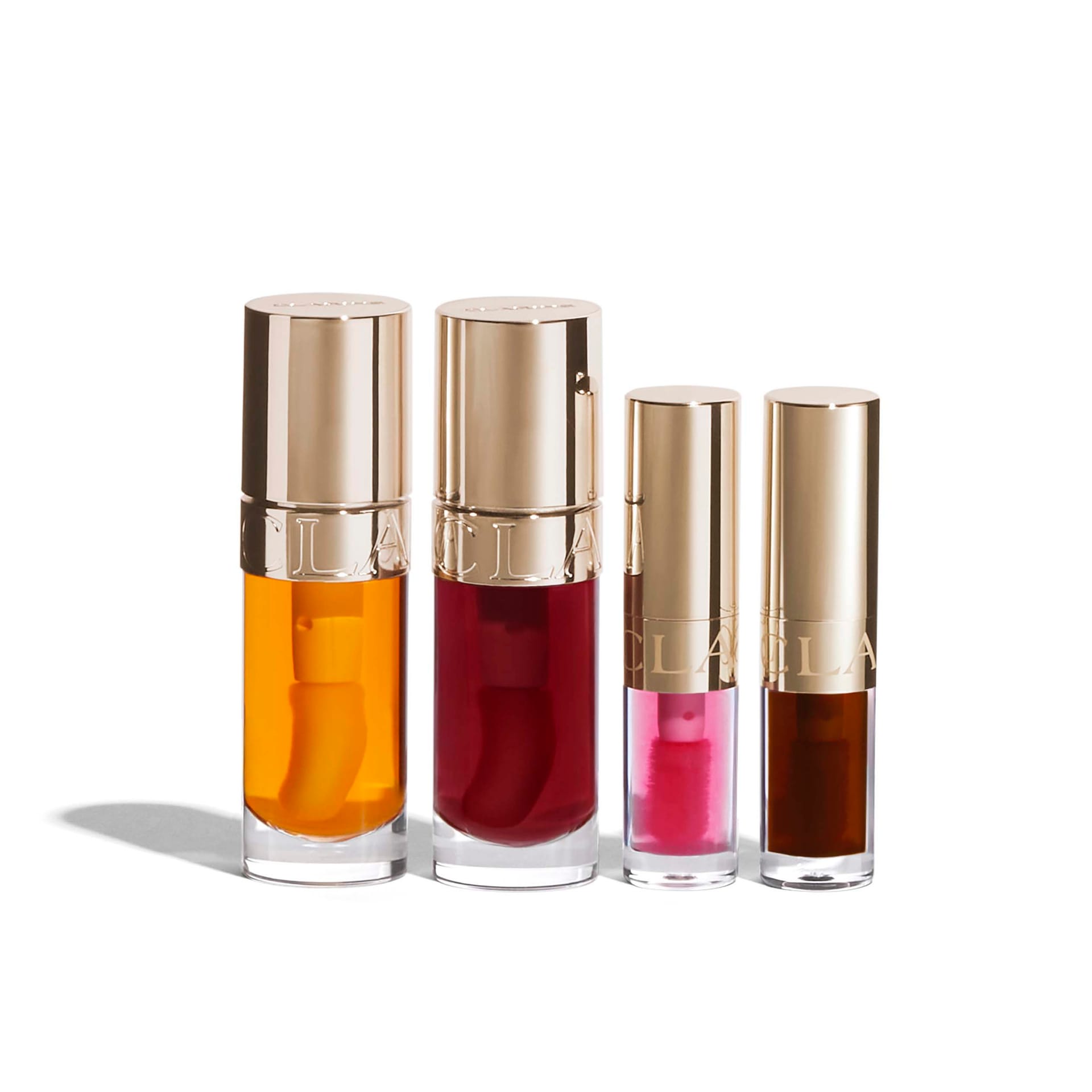 Набор (Масло-блеск для губ Lip Comfort Oil, 7 мл: тон 01-Honey+тон 03-Cherry. Масло-блеск для губ Lip Comfort Oil 1,4 мл: тон 04-Pitaya+тон 09-Сhocolate) - фото 2